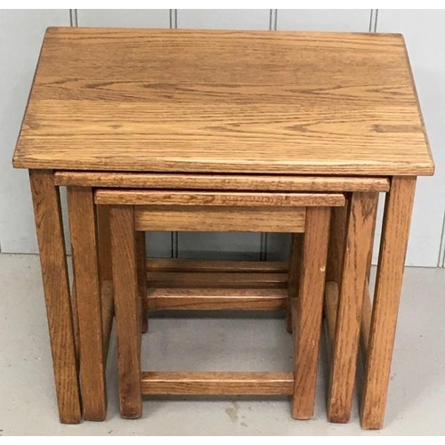 23A - A vintage oak nest of three tables. Largest dimensions(cm) H47, W52, D36.