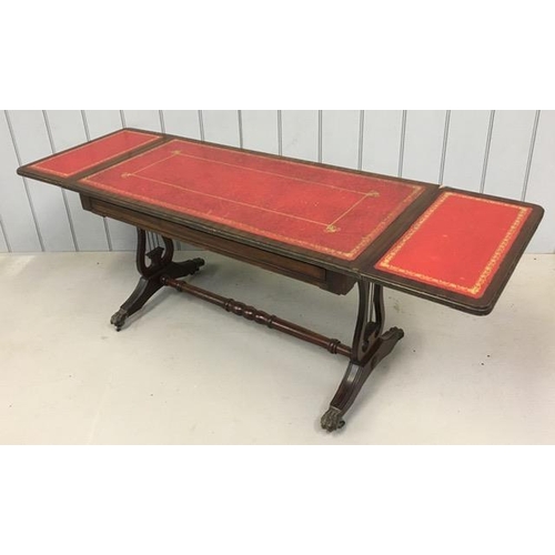 31 - A regency style, mahogany sofa table, with inset red leather top & two extending leaves. Dimensions(... 