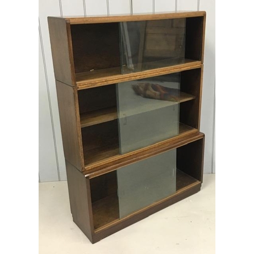 83 - An early 20th century, oak, modular 3-tier stacking bookcase, each tier with a set of glazed doors. ... 