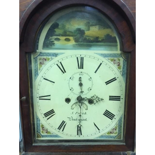 385 - A mid 19th century, oak long case clock, by S Polak, Features a cream coloured dial with roman numer... 