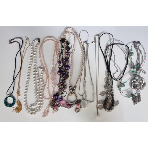 410 - A mixed lot of twelve costume necklaces, to include an abalone style example, faux pearls & crystal ... 