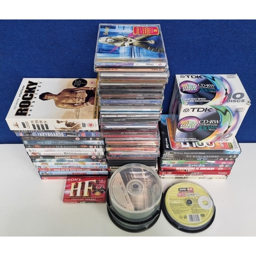 719 - A large lot of popular entertainment, to include CDs(x30+), DVD films(x25+), together with blank rec... 