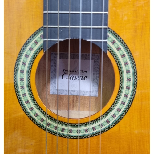 723 - A classical acoustic guitar, 'Special Edition Classic', together with a fabric case. Guitar length 1... 