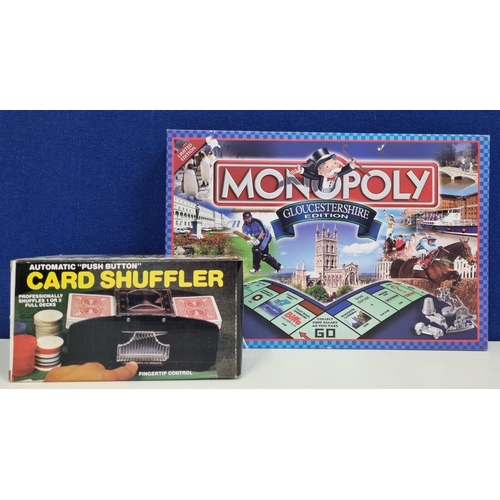 757 - A vintage, automatic card shuffler, together with a limited edition 'Monopoly, Gloucestershire' boar... 