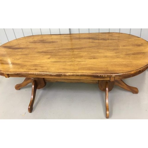 9 - A Malaysian, solid wood dining table, with twin pedestal supports. Dimensions(cm) H75, W200, D101.