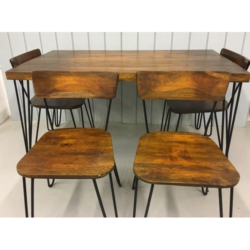 15 - A contemporary dining table, with four matching chairs. Solid wood, supported by hairpin legs. Table... 