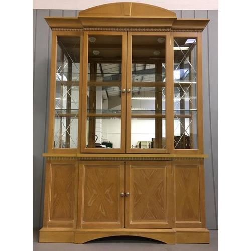 36 - A large, beech coloured display cabinet. Two glass shelves, with mirrored display area. Dimensions(c... 