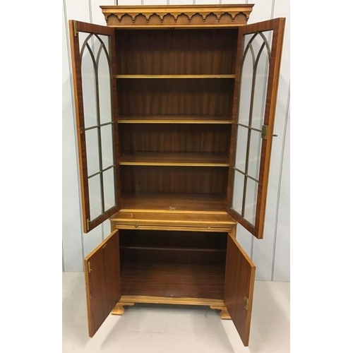 37 - A vintage, inlaid yew secretaire bookcase. Features a two-door, three-shelved, glazed bookcase, over... 