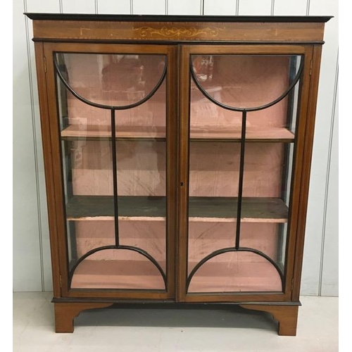 44 - An Edwardian, inlaid mahogany, glazed bookcase with two internal shelves. No key present & one pane ... 