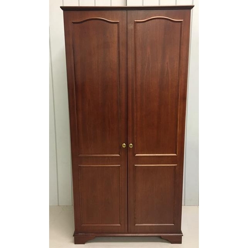 51 - A vintage double wardrobe, by Stag. Dimensions(cm) H187, W93, D59.