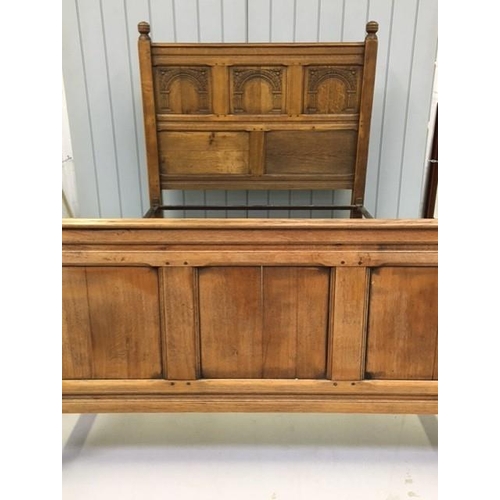 71 - An antique, oak carved & panelled double (4'6