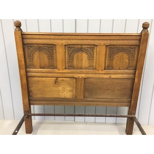 71 - An antique, oak carved & panelled double (4'6