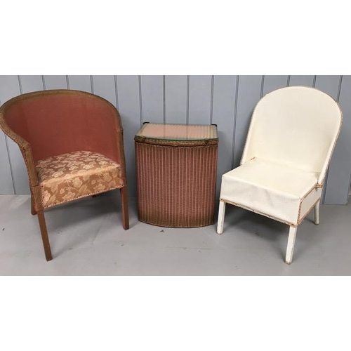 73B - Three items of cane furniture, including a Lloyd Loom 'Lusty' laundry basket, with similar styled tu... 