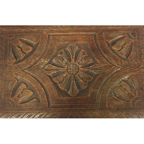 77 - A 19th century, carved oak side table, with turned legs & stretchered base, together with a later st... 