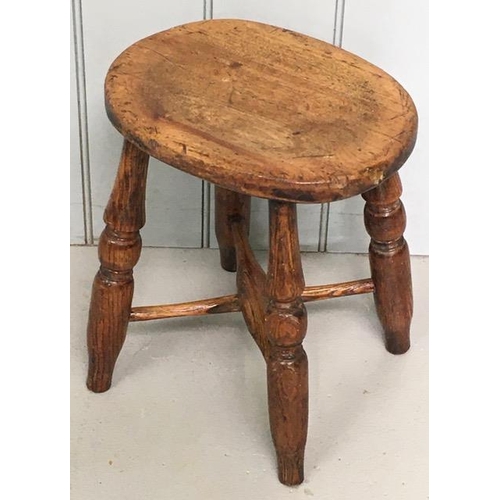 96 - A 19th century oak stool, with oval top & cross-stretcher. Dimensions(cm) H39, W33, D25.