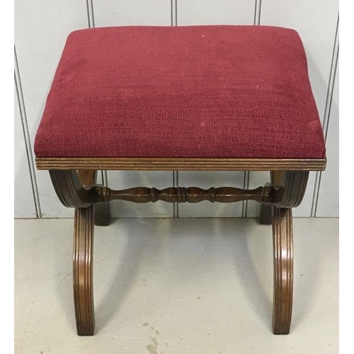 99 - An Edwardian x-frame stool, upholstered in a claret coloured fabric. Dimensions(cm) H48, W44, D37.