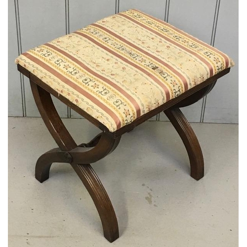 100 - An Edwardian x-frame stool, upholstered in a striped/patterned fabric. Dimensions(cm) H48, W44, D37.