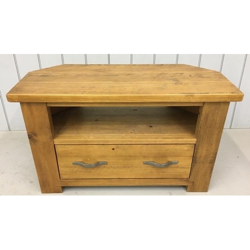 105 - A solid wood, corner TV cabinet, with single shelf & media drawer. Dimensions(cm) H57, W97, D45.