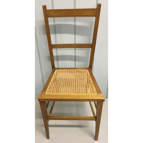 142 - A pair of Edwardian, mahogany inlaid side chairs, with bergere seats. Complete with later/removable ... 