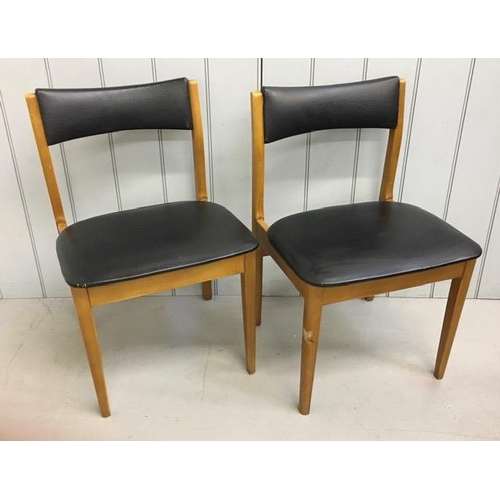 164 - A pair of mid-century, teak dining chairs. Dimensions(cm) H74(44 to seat), W49, D47.