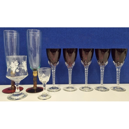 211A - A quantity of drinkware, to include wine glasses & a sherry glass. Five attractive 'ruby' style wine... 