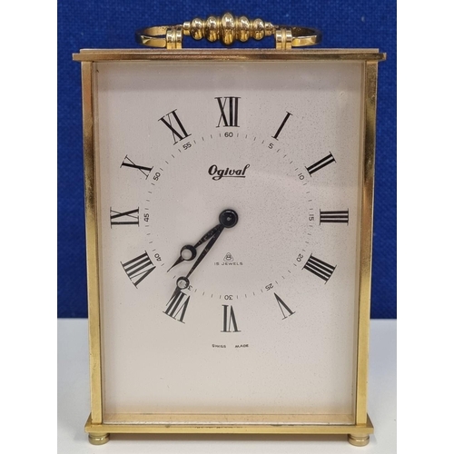 395 - A Swiss-made 'Ogival' mechanical carriage clock, c.1980s. Untested. Dimensions(cm) H14, W10.5, D5.5.