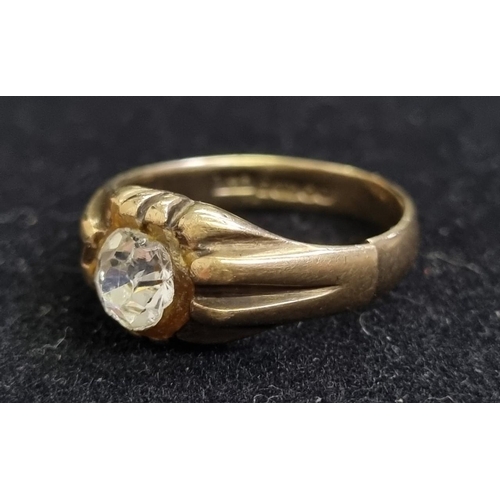 403 - A gentleman's '375' 9ct yellow gold zirconia solitaire ring. Birmingham 1993. Size R. Weight approx,... 