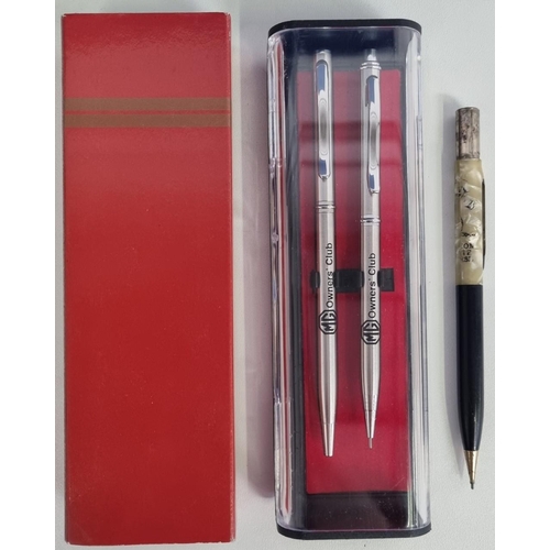 652 - An original 'Sheaffer' pencil, together with a boxed pen & pencil set from 'MG Owner's Club'. The la... 