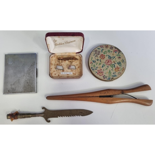 670 - An assortment of useful antique items to include a WWI period trench art letter opener, a glove stre... 