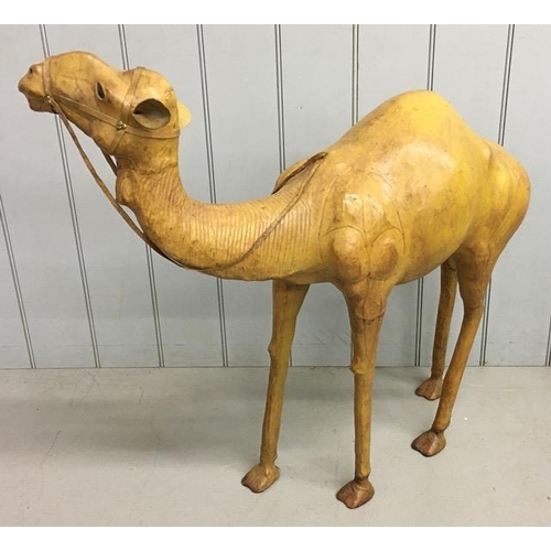 700 - A rare leather-clad, sculptured Camel figure, by Liberty of London. Likely purchased as a decorative... 