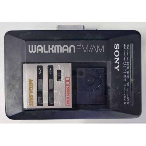 722 - A Sony Walkman FM/AM Mega Bass Tape Player. Dimensions(cm) H9, W13.5.' Untested' condition.