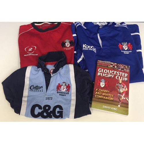 734 - Three pre-worn Gloucester rugby shirts, sizes XSB & 2xM, together with 'A Cherry and Whites Companio... 