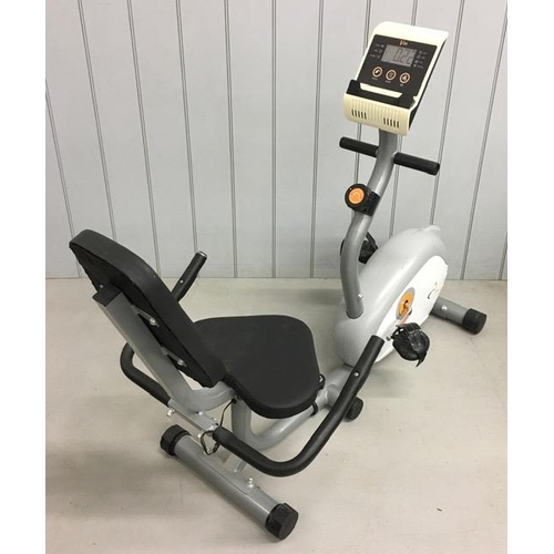 751 - A recumbent magnetic exercise bike, by V-Fit. Tested & appears in full working order.