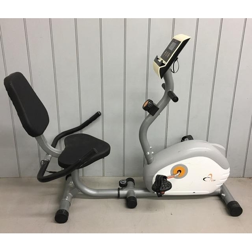 751 - A recumbent magnetic exercise bike, by V-Fit. Tested & appears in full working order.