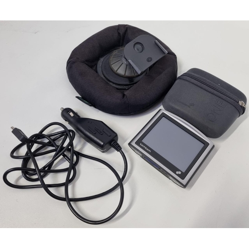 790 - A 'TomTom One' sat nav, complete with a zip case, power lead, a 'Nav Mat' & holder. Untested.