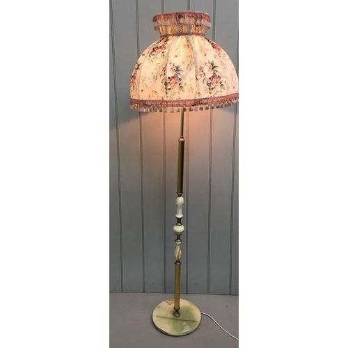 814 - A brass/onyx standard lamp, with shade. Tested & appears in full working order.