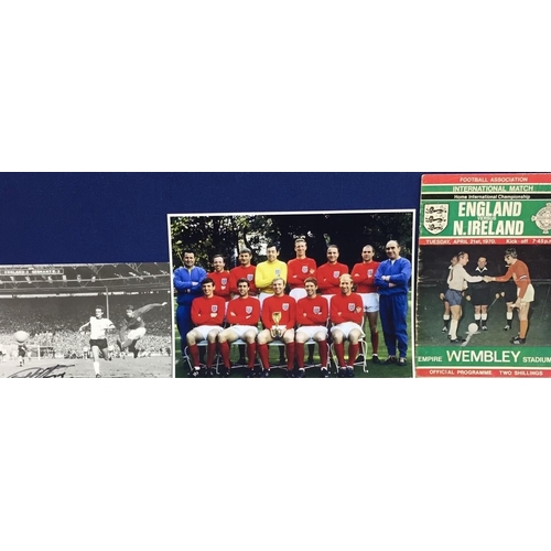 1694 - A signed photo of Geoff Hurst's famous 1966 world cup goal, together with a colour team photo & home... 