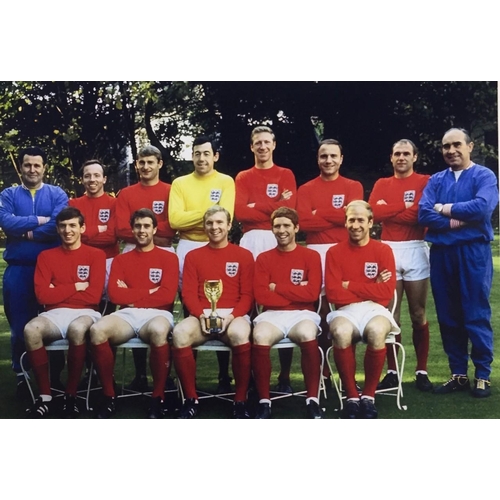 1694 - A signed photo of Geoff Hurst's famous 1966 world cup goal, together with a colour team photo & home... 