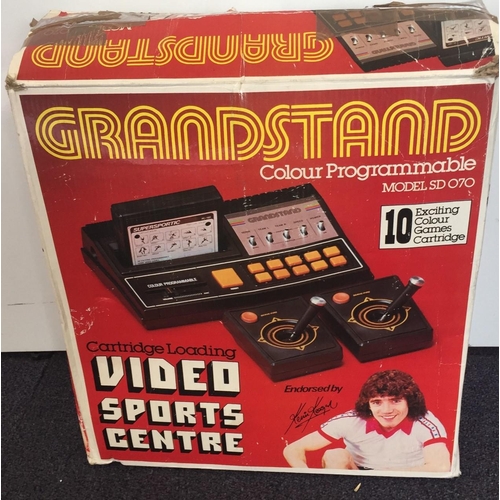 1807 - A Grandstand 10 colour programmable video sports centre(model SD070), original box, with cartrisges.