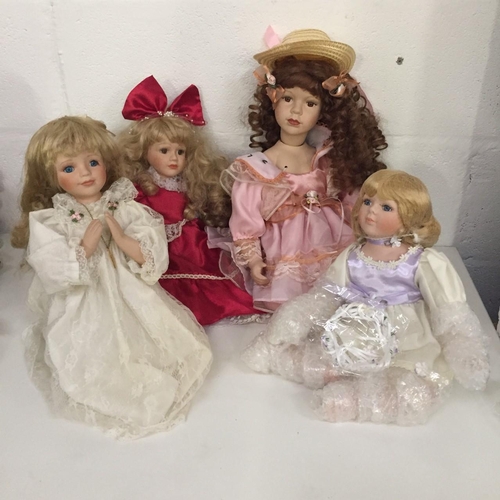 1829 - A collection of 4 unboxed sitting/kneeling porcelain dolls.