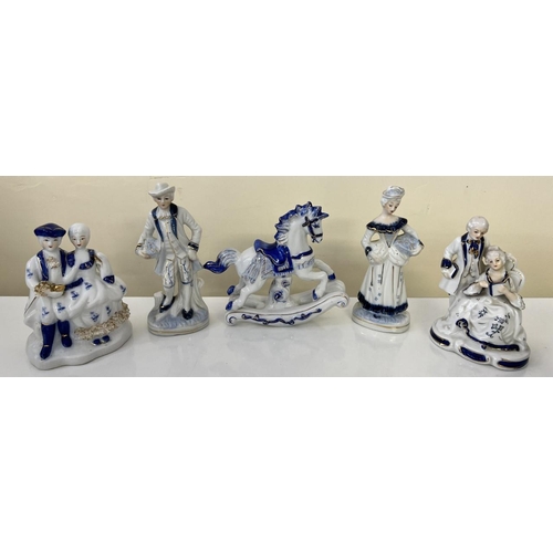 499 - A collection of four, vintage, blue & white figurines, together with a rocking horse.