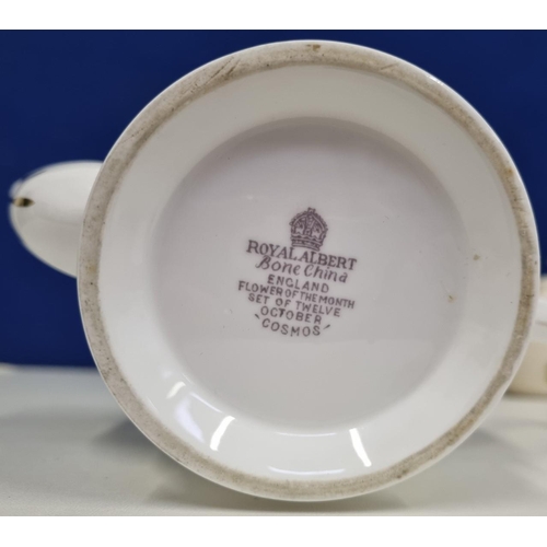 A collection of teapots. Five examples in pastel tones. Includes a