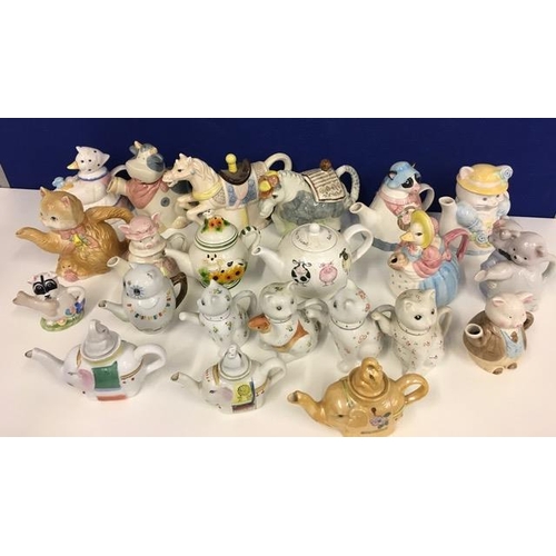 622N - A collection of twenty-three, animal-related, novelty teapots.