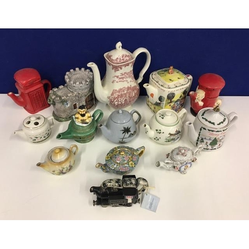 622W - A collection of fourteen novelty teapots. Includes Myotts, Sadler, Tony Carter etc.