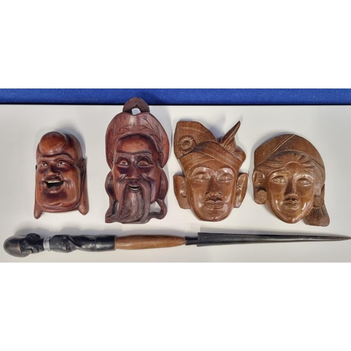 685 - A selection of tourist pieces from Japan, Bali & Africa. To include a laughing Buddha wall plaque, a... 