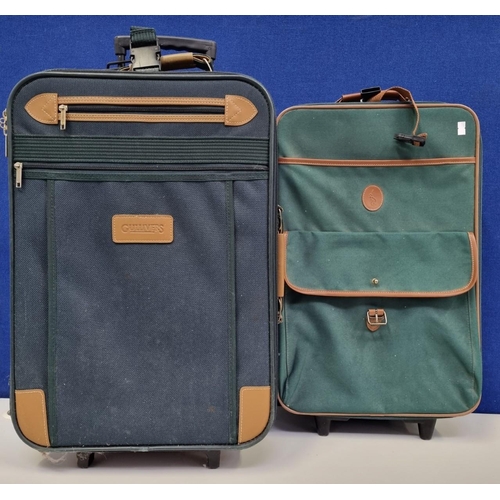 702 - Two larger size, branded suitcases to include a 1980s 'Ralph Lauren' and 'Gullivers' examples. The l... 