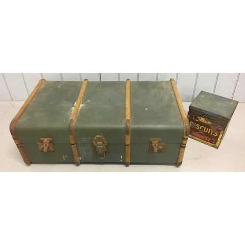 709 - A vintage trunk, together with an early Cadbury's Lincoln biscuit tin.