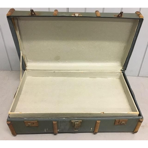 709 - A vintage trunk, together with an early Cadbury's Lincoln biscuit tin.