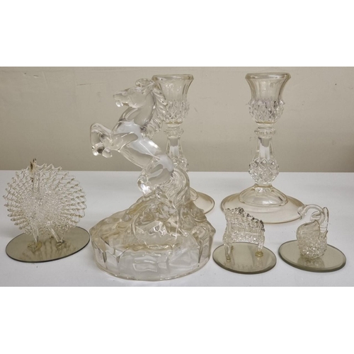 206A - An assortment of decorative glassware, to include a pair of candlesticks, together with a horse orna... 