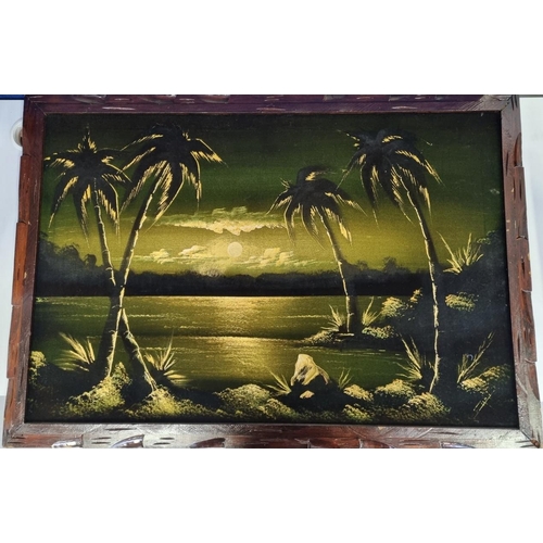 333 - A larger size, stretched black velvet oil painting of a tropical sunset, mounted in a decorative woo... 